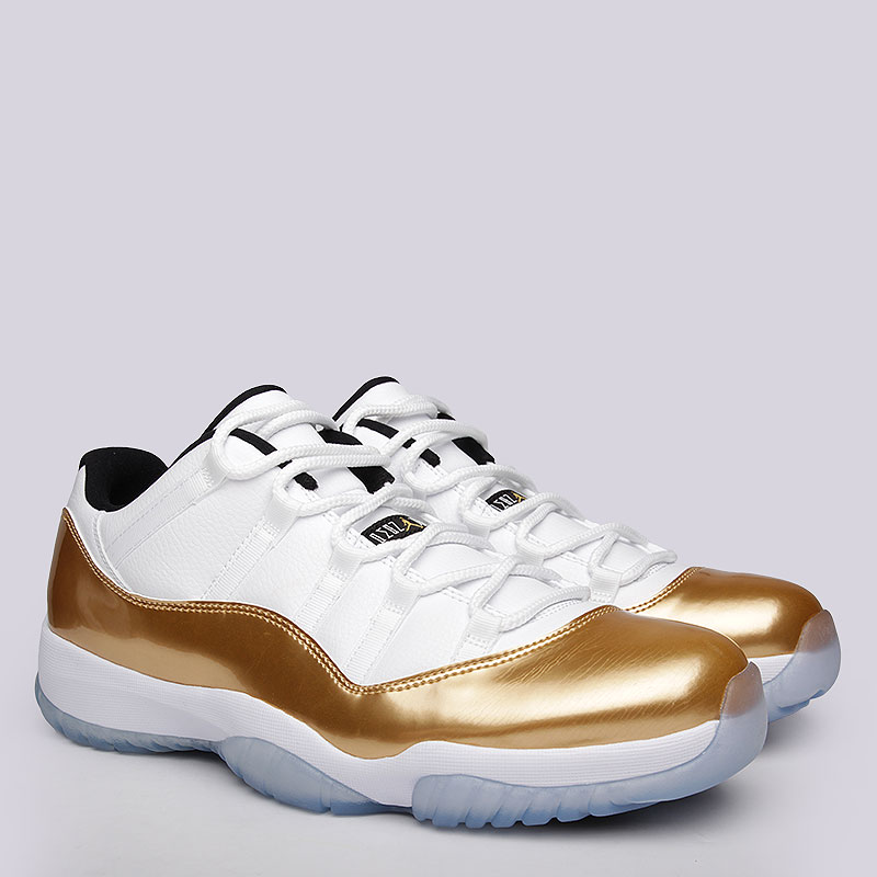Кроссовки Air Jordan XI Retro Low Кроссовки Air Jordan XI Retro LowКроссовки lifestyle<br>синтетика, текстиль, резина.<br><br>Цвет: белый, золотой.<br>Размеры US: 14<br>Пол: Мужской