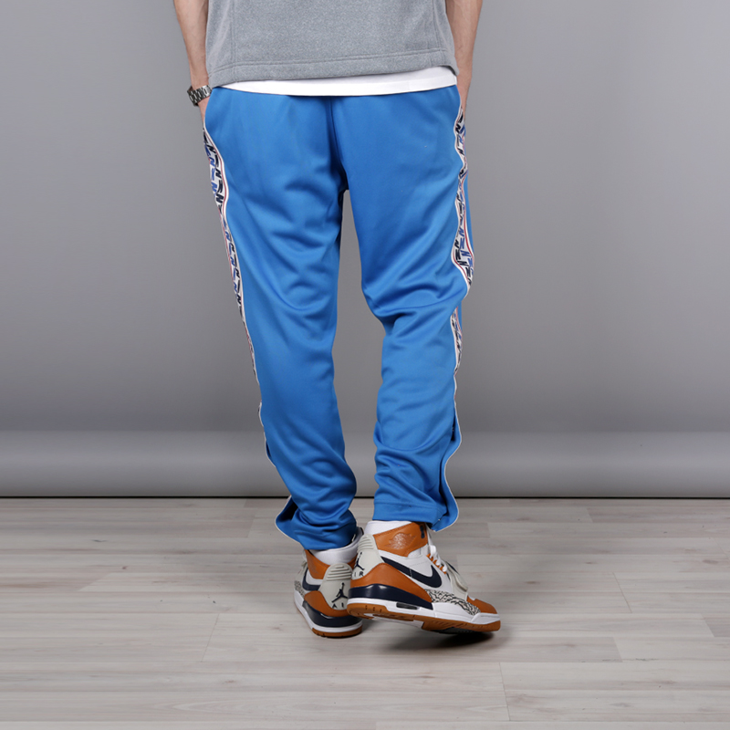мужские голубые брюки Nike Taped Poly Pant AJ2297-465 - цена, описание, фото 4