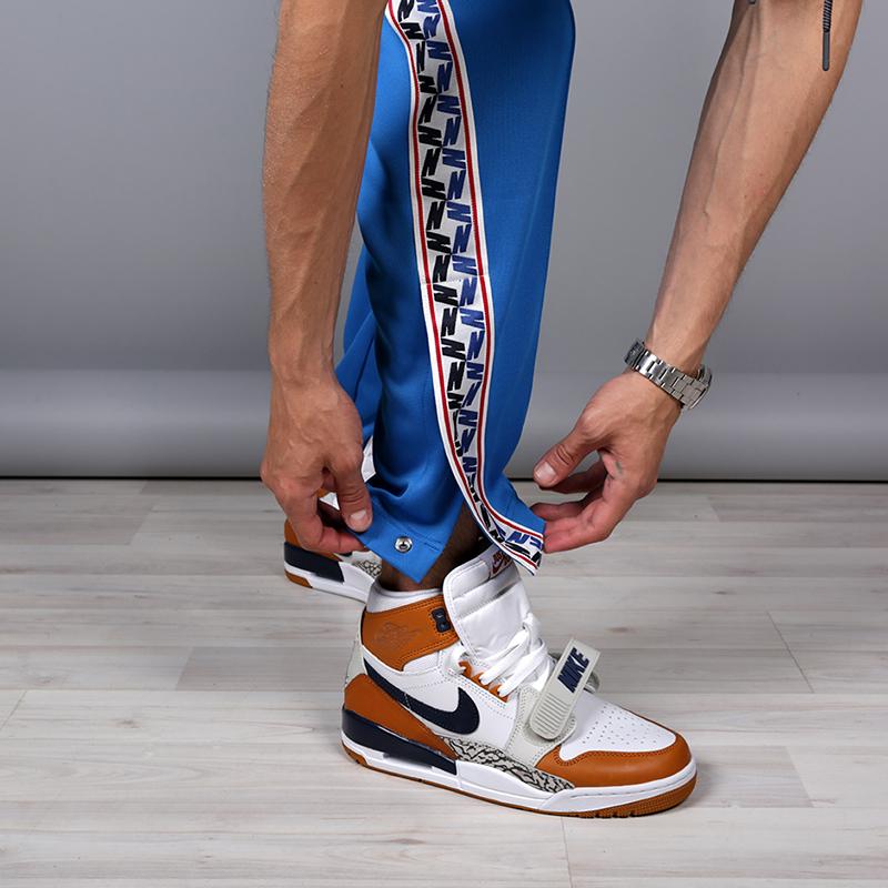 мужские голубые брюки Nike Taped Poly Pant AJ2297-465 - цена, описание, фото 6