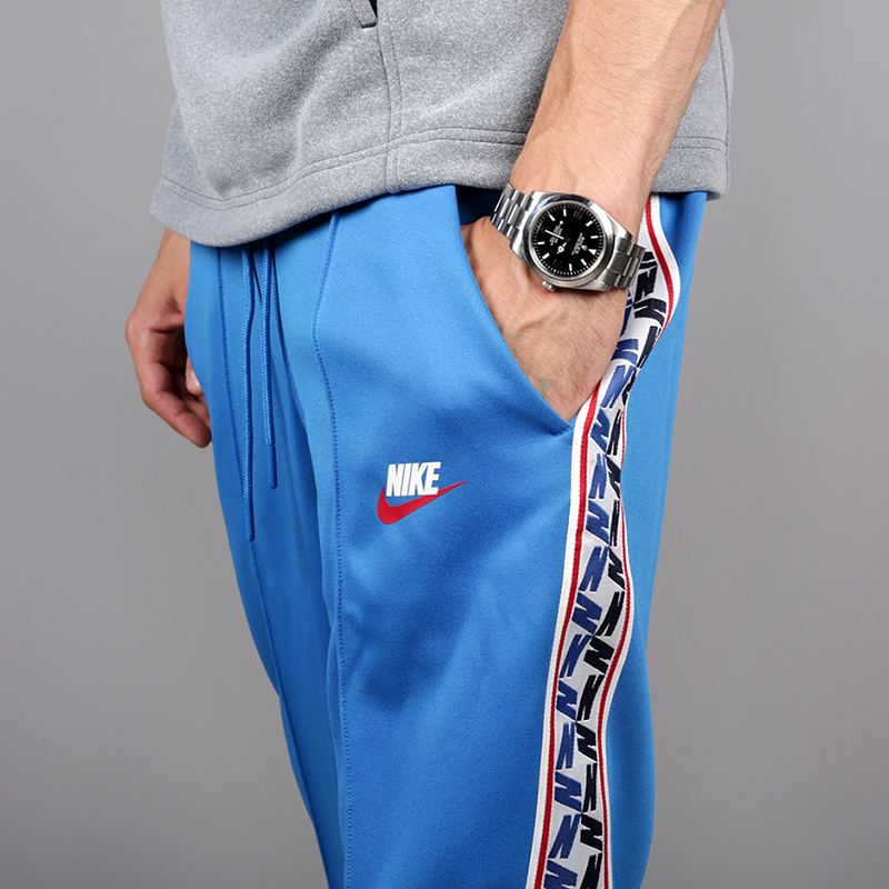 мужские голубые брюки Nike Taped Poly Pant AJ2297-465 - цена, описание, фото 3