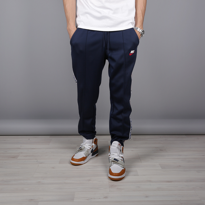 мужские синие брюки Nike Taped Poly Pant AJ2297-451 - цена, описание, фото 1
