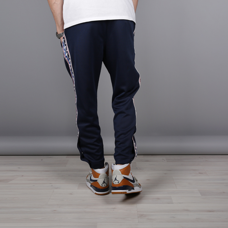 мужские синие брюки Nike Taped Poly Pant AJ2297-451 - цена, описание, фото 4
